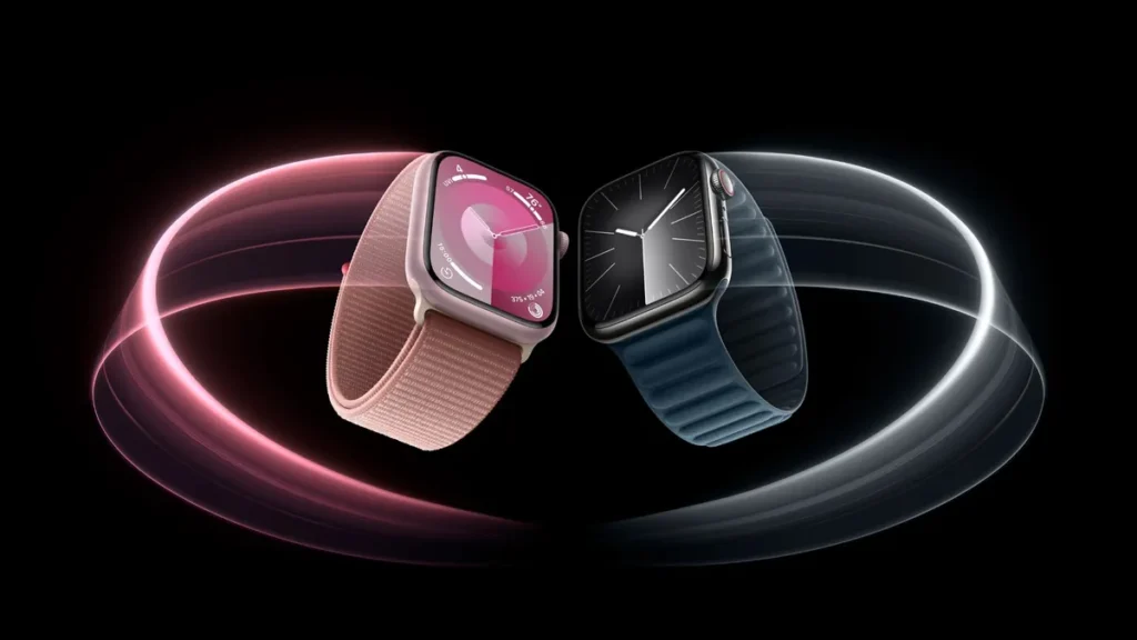 Two Apple Watch Series 9 models shown with colorful light trail background.