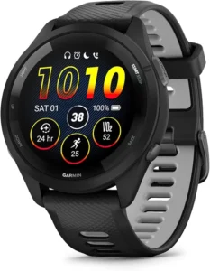 Garmin fitness watch with round AMOLED display showing heart rate, VO₂ max, steps, and battery status, designed for running and performance training.